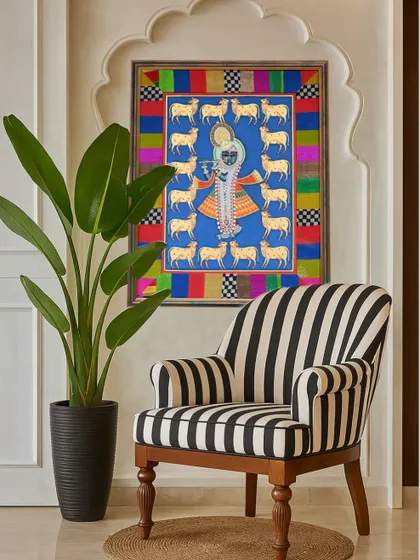 Here is a finished Pichwai painting, beautifully settled in its new home in Singapore. I created a custom fabric border using colorful studio offcuts, carefully pieced together to echo the vibrant palette of the artwork without overpowering it. It shows how a thoughtful frame can elevate a piece of art into a personal statement.
