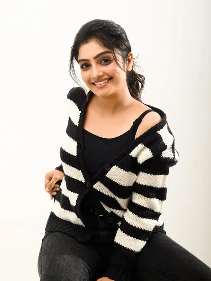 A happy, smiling portrait that feels full of life. This is a perfect shot for a personal branding or social media profile.