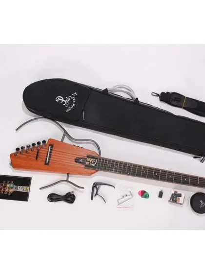 The complete Tiger Roger travel guitar kit. It comes with a custom gig bag, stand, strap, capo, and other accessories, giving you everything you need to play on the move.