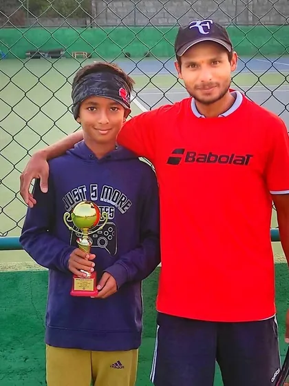 We are incredibly proud of our players' success. Here I am with our student Likith S Gowda after he secured a runner-up position in the U-12 AITA Champion Series tournament.