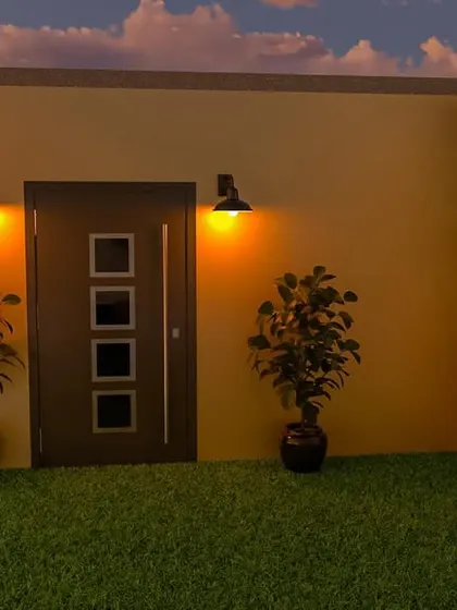 Another view from the marriage hall project, this render shows an entrance area with a small lawn, potted plants, and a unique slatted wood feature wall.