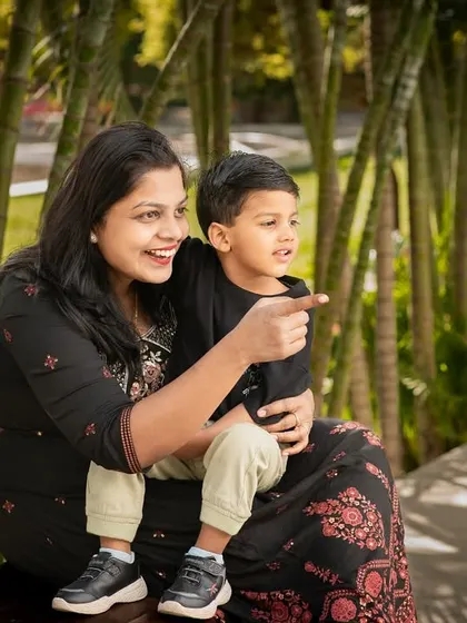 A mother and son exploring the park together. I love capturing these little moments of discovery and connection during our outdoor sessions.