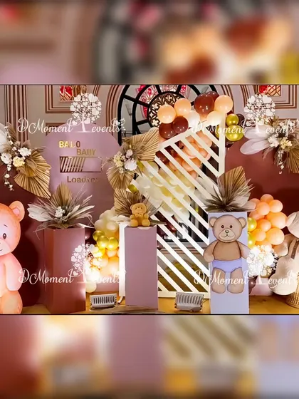 A sophisticated teddy bear themed stage for a Mundan ceremony, using a modern design with clean lines, dried florals, and a muted color palette.