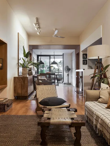 The main living space in 'Reweave Stories' is long and linear. We broke up the space with distinct furniture groupings to create different zones for relaxing and socializing.