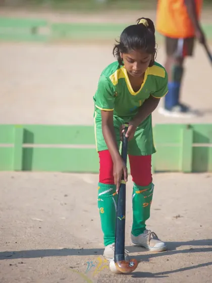 A young player from our 2022 camp, demonstrating excellent posture and control.