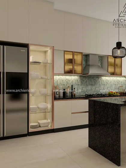 Another view of the modern kitchen, showing the side-by-side refrigerator and the glass-fronted crockery unit. The design is both stylish and highly practical.