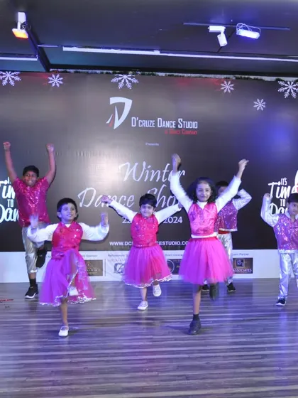 Our grooming kids batch in their dazzling costumes, full of excitement at the Winter Dance Showcase.
