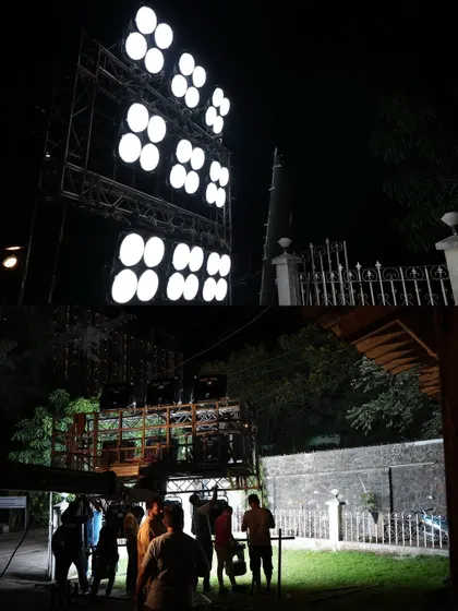The crew setting up the Filmgear Mega 1200C wall of light for an outdoor night shoot.