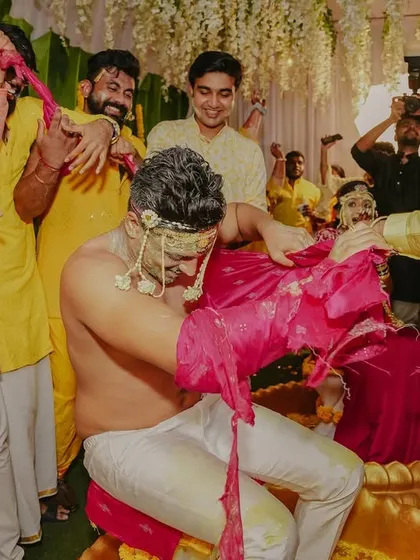 The aftermath of the 'kurta-faad' tradition, a moment of pure, unscripted fun.