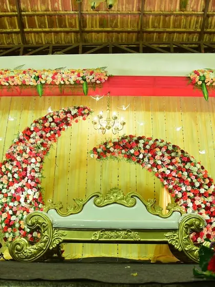 Another angle of the dual crescent floral stage for a wedding reception. The rich colors and bold design make a powerful statement.