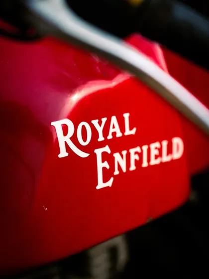 A clean, detailed shot of the iconic Royal Enfield logo. This kind of product-focused shot is great for brand collaborations.