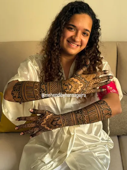The smile of a happy bride is my greatest achievement. It was a joy to create this full-arm, detailed mehendi for her, ensuring every line was balanced and the final look was as timeless as her celebration.