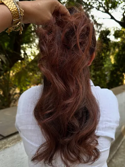 The ponytail view of the 'Cowboy Copper' hair.
