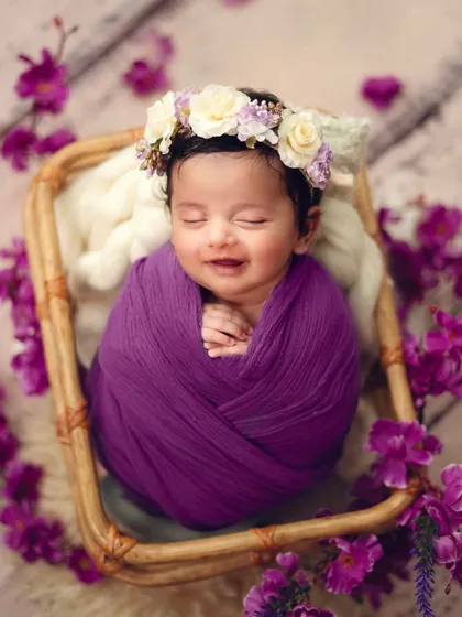 This is the same sweet baby, dreaming peacefully. Capturing multiple expressions during a session gives you a beautiful variety of portraits to choose from.