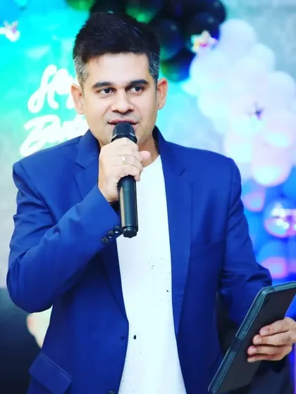 A clear, professional photo of me hosting, ready to bring energy to your event.