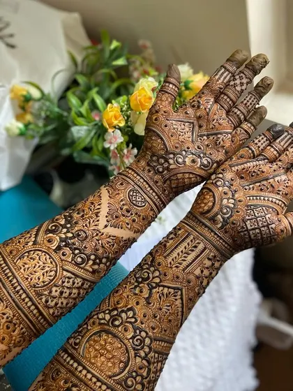 This is a detailed view of my intricate bridal henna work. Each design is unique, combining traditional patterns like paisleys and mandalas with fine-line fillers to create a stunning, full-coverage look for your special day.