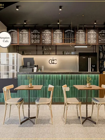 The main service counter of the Mangalore Cafe concept, featuring a back-lit green tiled front, a clear menu board system, and an efficient workflow layout.