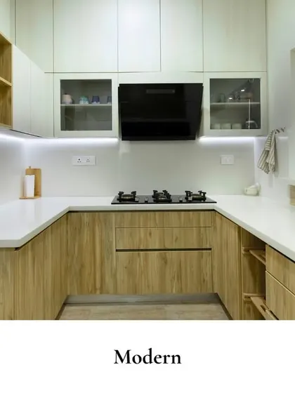 This sleek and functional kitchen blends contemporary design with warmth. The wood-finish cabinetry adds a natural touch, while clean white countertops and ambient lighting bring a bright, modern vibe.