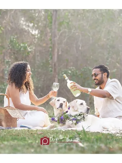 A beautiful family picnic with their two Labradors, Leo and Fluffy. Outdoor family sessions are a wonderful way to capture everyone together in a relaxed, natural setting.