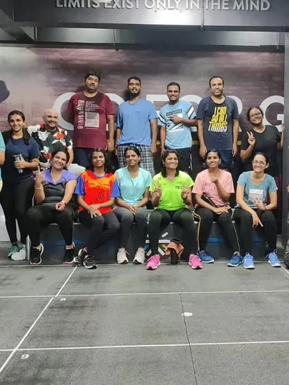 The heart and soul of my classes. Each photo captures a unique moment with my incredible community after a sweaty, joyful session. This is our shared victory lap.