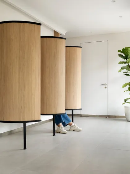 Designing a waiting area for a plastic surgery clinic requires a unique balance of comfort and privacy. We created distinct, partitioned areas to ensure post-treatment patients have the utmost privacy and feel at ease during a vulnerable time.