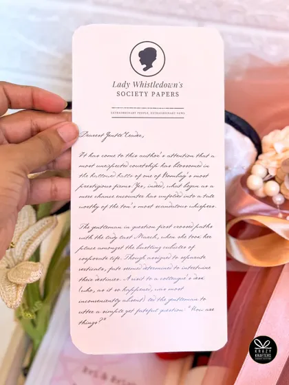 Dearest Gentle Readers, this proposal hamper was inspired by Bridgerton. We created a custom "Lady Whistledown's Society Papers" announcement for a truly grand gesture.