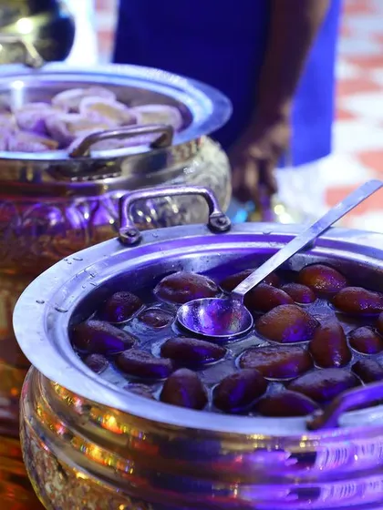 A close-up of our delicious Gulab Jamun, a perfect sweet ending to a grand meal.