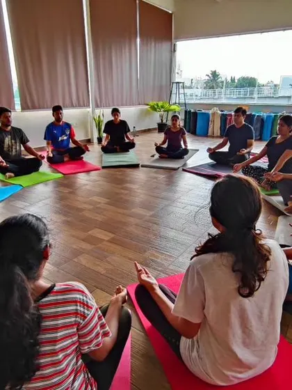 Our class gathered in a circle for Om chanting. This practice creates a powerful collective energy, promoting peace and mental clarity for everyone in the room.