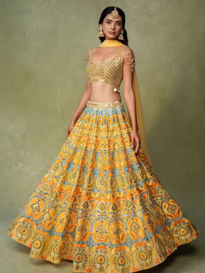 A classic bridal lehenga shot for an e-commerce brand. The full flare of the skirt is displayed, giving customers a complete view of the product.