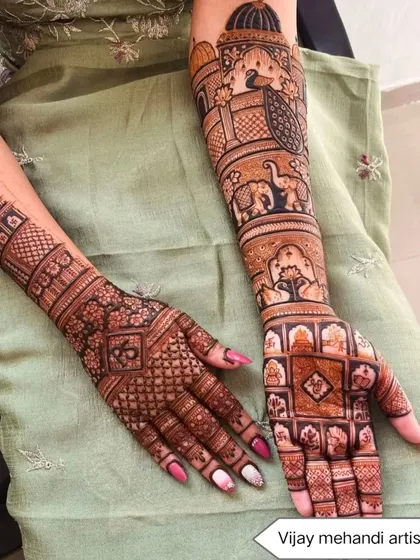 A unique bridal design that tells a story, with elephants, peacocks, and personalized initials. The mix of geometric and figurative art makes this a standout piece.