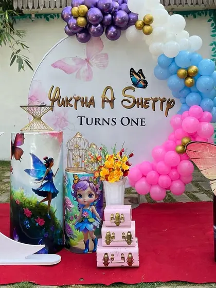 Another angle of the enchanting Fairy Butterfly theme, showing the crescent moon prop and themed pedestals.