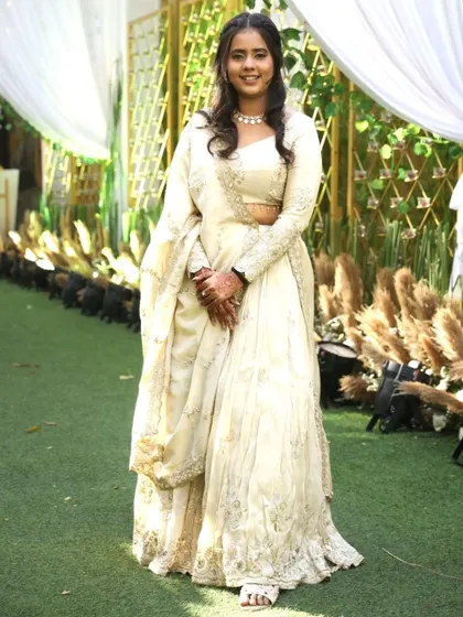 She's glowing like a dream! A picture-perfect moment with our client Jiya in her handcrafted lehenga. Her smile makes the outfit shine even brighter.