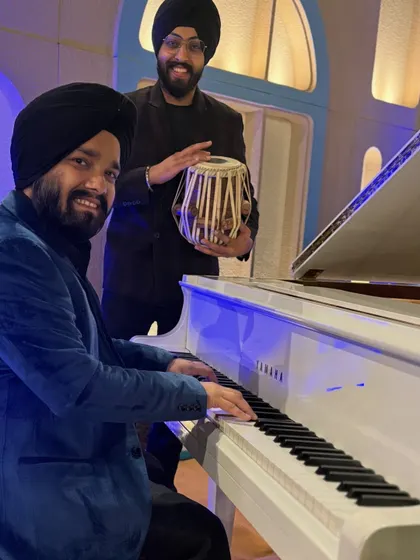 A great moment captured with the pianist during our instrumental fusion show. The joy of creating music together is evident.