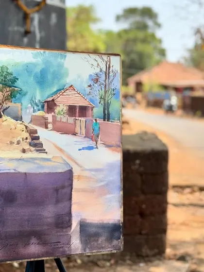 A watercolour landscape demonstrated in Devrukh, Ratnagiri. The painting captures a quiet street scene in the Konkan region of Maharashtra.