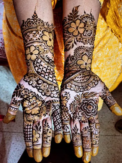 A mix of floral patterns and geometric grids creates a balanced and beautiful bridal design.