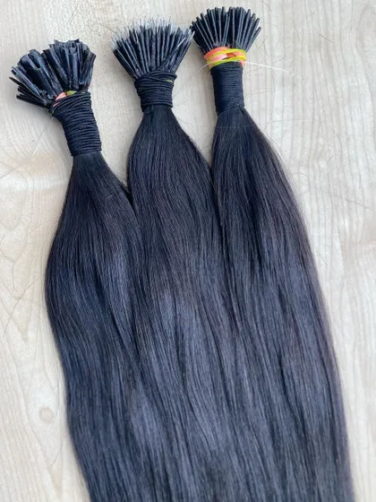 Three bundles of our natural black I-Tip extensions, ready for application. The quality is consistent, making them reliable for professional salon use.