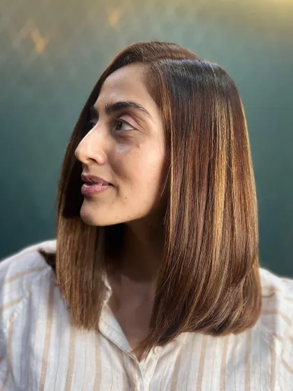 A side profile of the rich Biscoff bob, showing off its sharp lines and glossy, multi-tonal color.