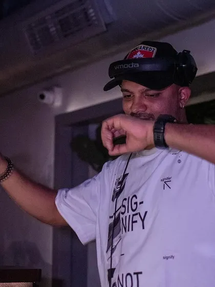 Another action shot from behind the decks. It's all about the passion for music and sharing it with others.