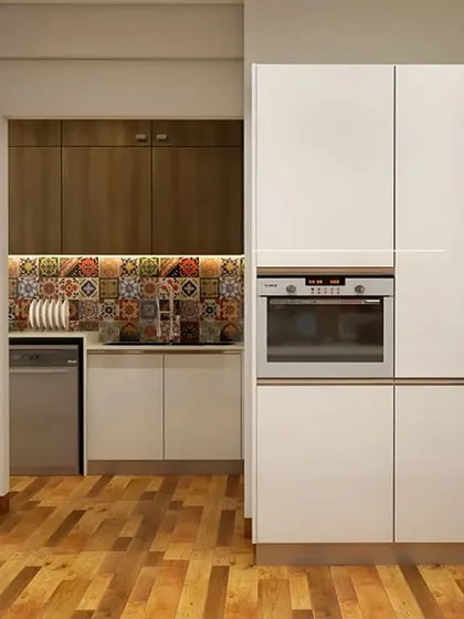 A kitchen that combines white and wood-finish cabinets with a vibrant, decorative tile backsplash. This design includes a dedicated space for a dishwasher.