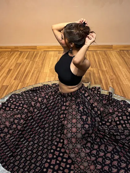 A candid shot while getting ready for a performance. This behind-the-scenes moment shows a glimpse of my preparation process.