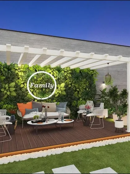 A 3D concept for a terrace with a white pergola, a "Family" sign on a green wall, and a comfortable seating area on a wooden deck.