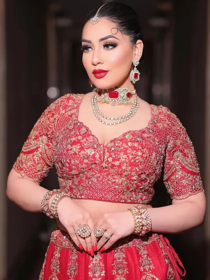 You can never go wrong with a classic red lip. This look is for our timeless brides who want that iconic combination of bold lips, defined eyes, and radiant skin for their wedding day.