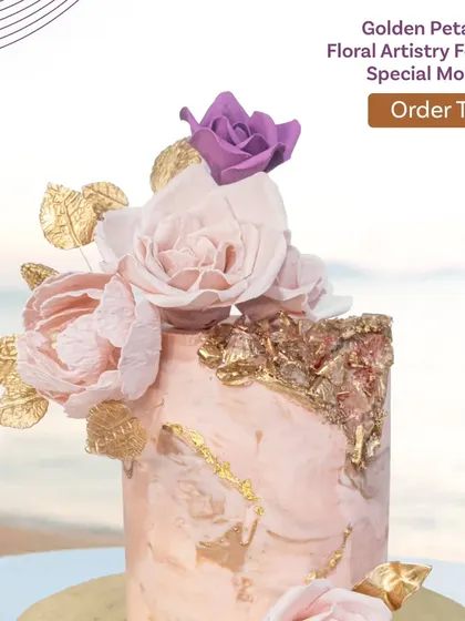 A closer look at the golden petals and floral artistry on this beautiful beach-themed cake.