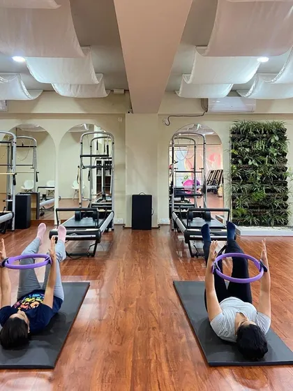 The symmetry of movement during a partner mat class is beautiful to see. It demonstrates a shared commitment to physical and mental well-being.
