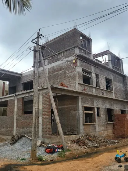 A new project beginning to rise. This photo captures the early stages of construction, with the ground floor structure and columns in place, ready for the next level.