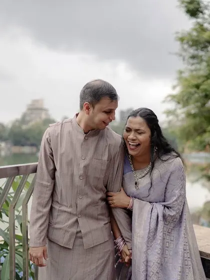 A burst of laughter from Susheta as she walks with Abhishek. Capturing these moments of pure happiness is my favorite part of being a wedding photographer.