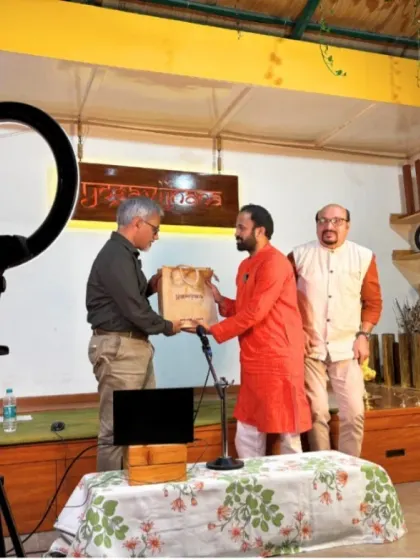 A moment of appreciation at the conclusion of our Yoga Vichara talk, where I am presenting a token of gratitude to our guest speaker, Prof. A G Ramakrishnan.