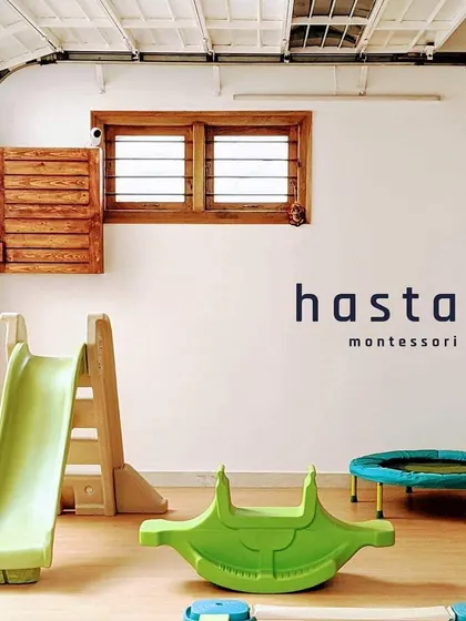 Learning isn't confined to tables. Our indoor play zone, with its slide, rocker, and trampoline, is essential for developing gross motor skills. It's a space for joyful movement, balance, and coordination, all on a soft, safe floor.