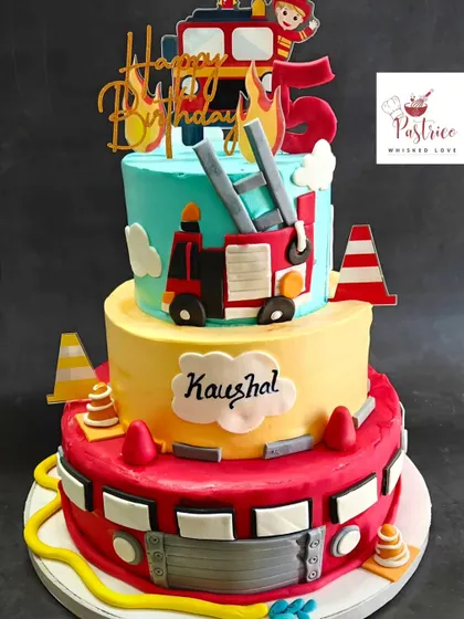 Sound the alarm for a fun birthday! This three-tiered firefighter-themed cake is perfect for a little hero's celebration.
