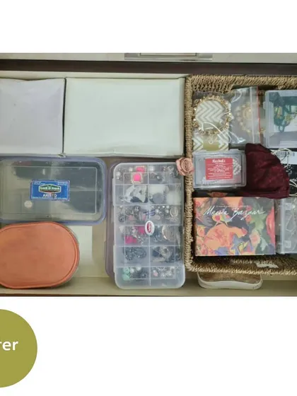 After organizing, the same drawer is now perfectly tidy. We used a jewelry organizer and other small containers to give every single item a designated home.